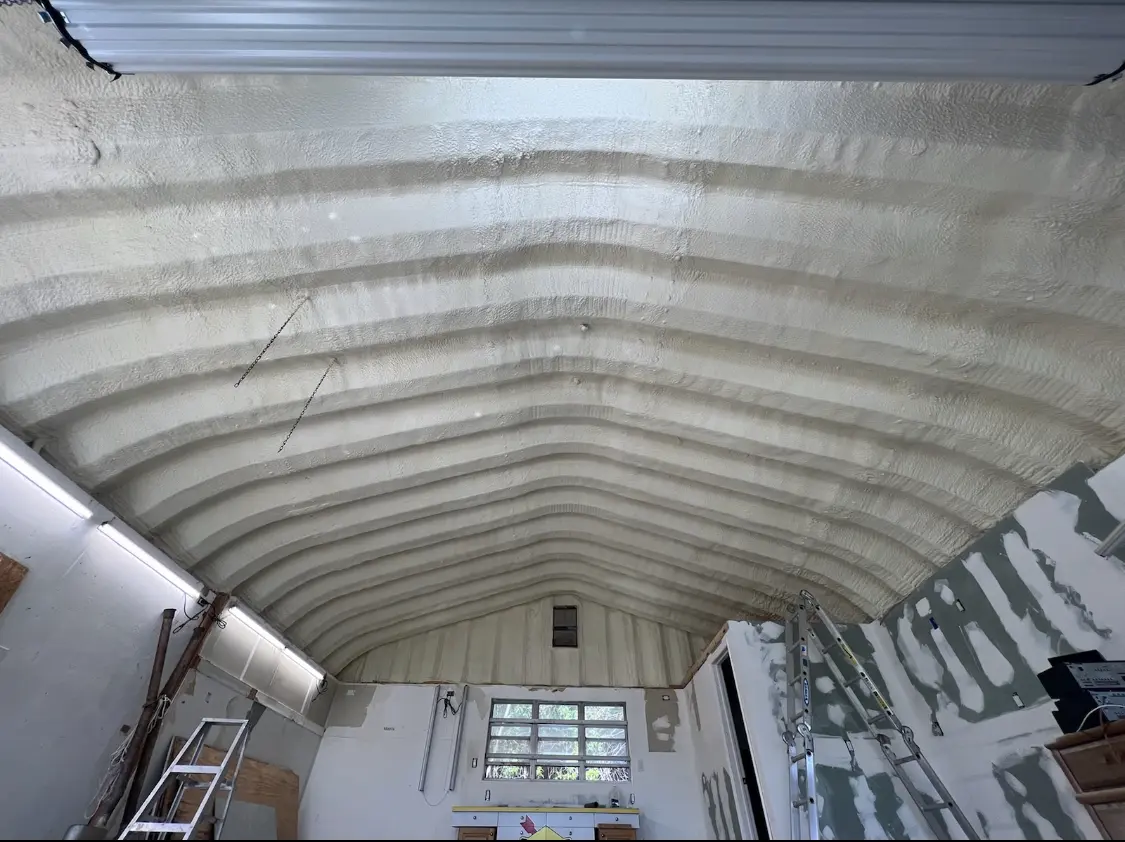 Spray polyurethane foam applied to the underside of a metal roof deck in Samsula-Spruce Creek